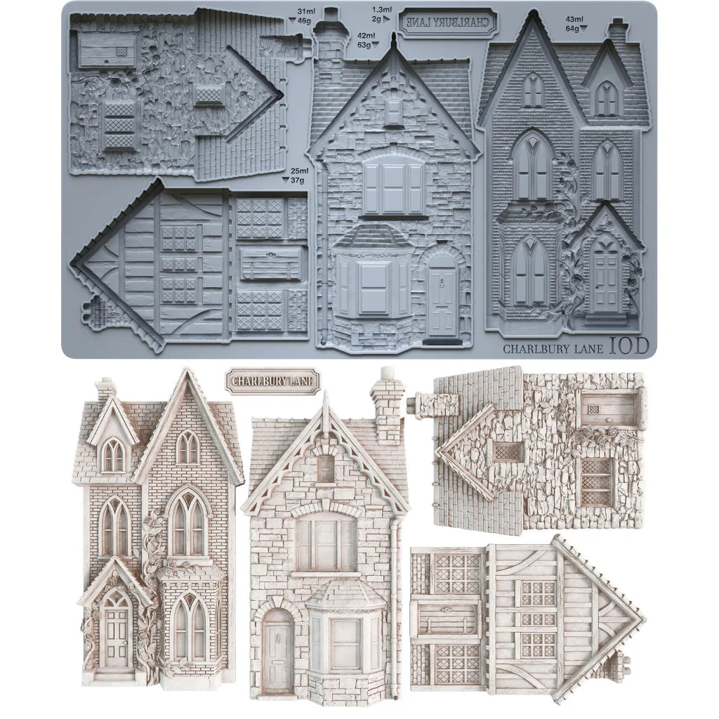 A set of miniature Victorian house templates and roof designs shown both assembled in gray and as unfolded paper/cardboard components on a white background. The text 'CHARLIE BAY LOND' and '10D' are visible on the gray assembled sheet.