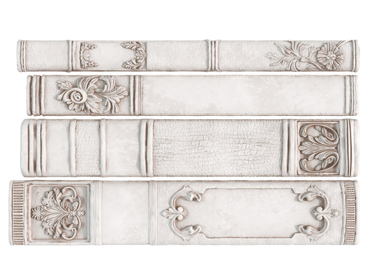Decorative bookends with intricate designs on a white background