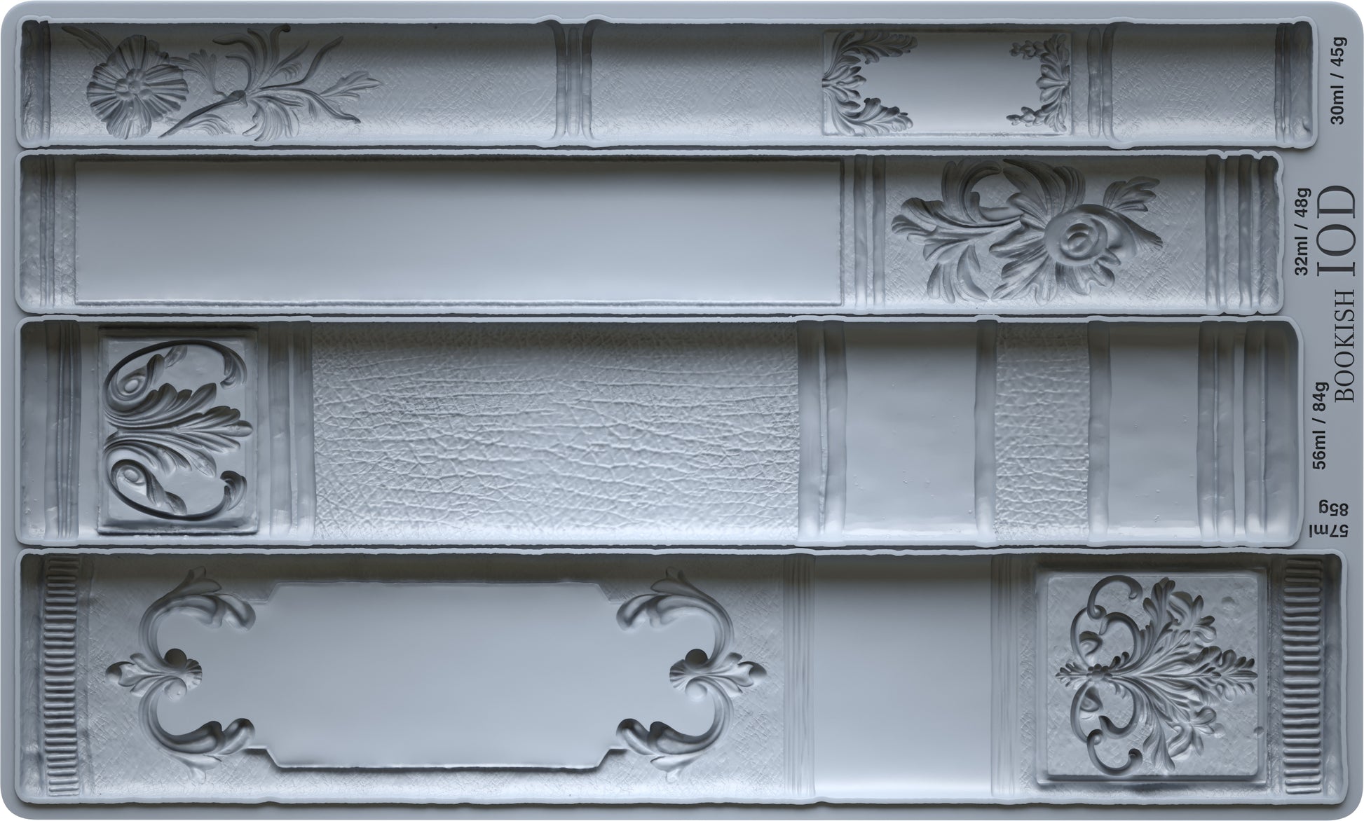 Decorative mold with bookshelf design patterns on a gray background