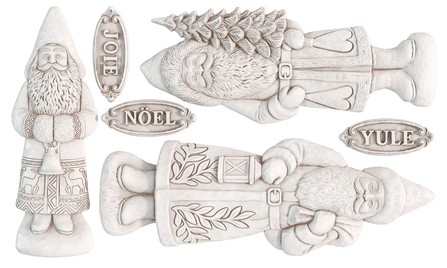 Four white holiday garden gnome figurines with engraved details, including one holding a Christmas tree and three with nameplates reading JOE, NOÉL, and YULE.
