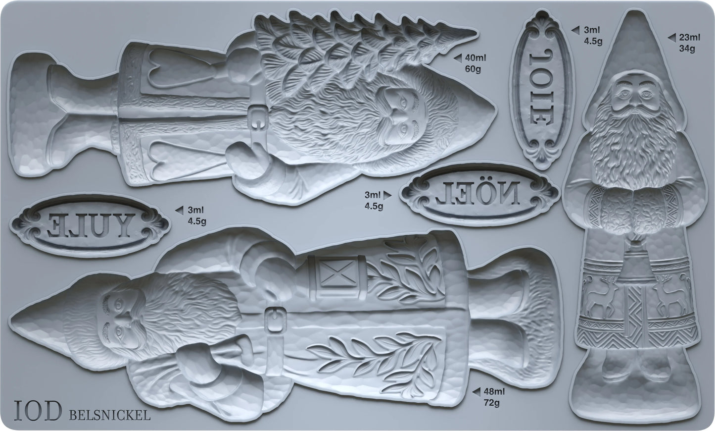 A silver silicone mold set featuring multiple Christmas-themed cavities, including a large Santa Claus figure, a fish-shaped ornament, a gnome, and several small labeled pieces with measurements and names like JOIE, XULIE, and MÄL.