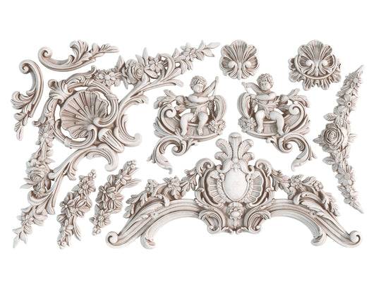 Decorative architectural elements with floral and putto designs on a white background