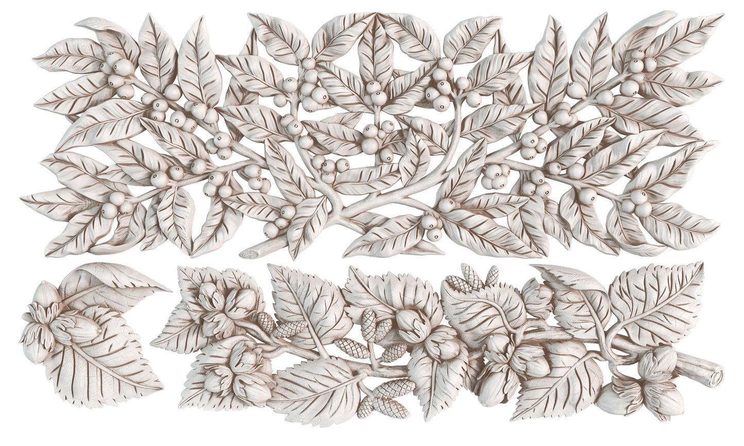 A set of white carved decorative wall panels featuring detailed botanical leaf and berry motifs, arranged on a plain white background.
