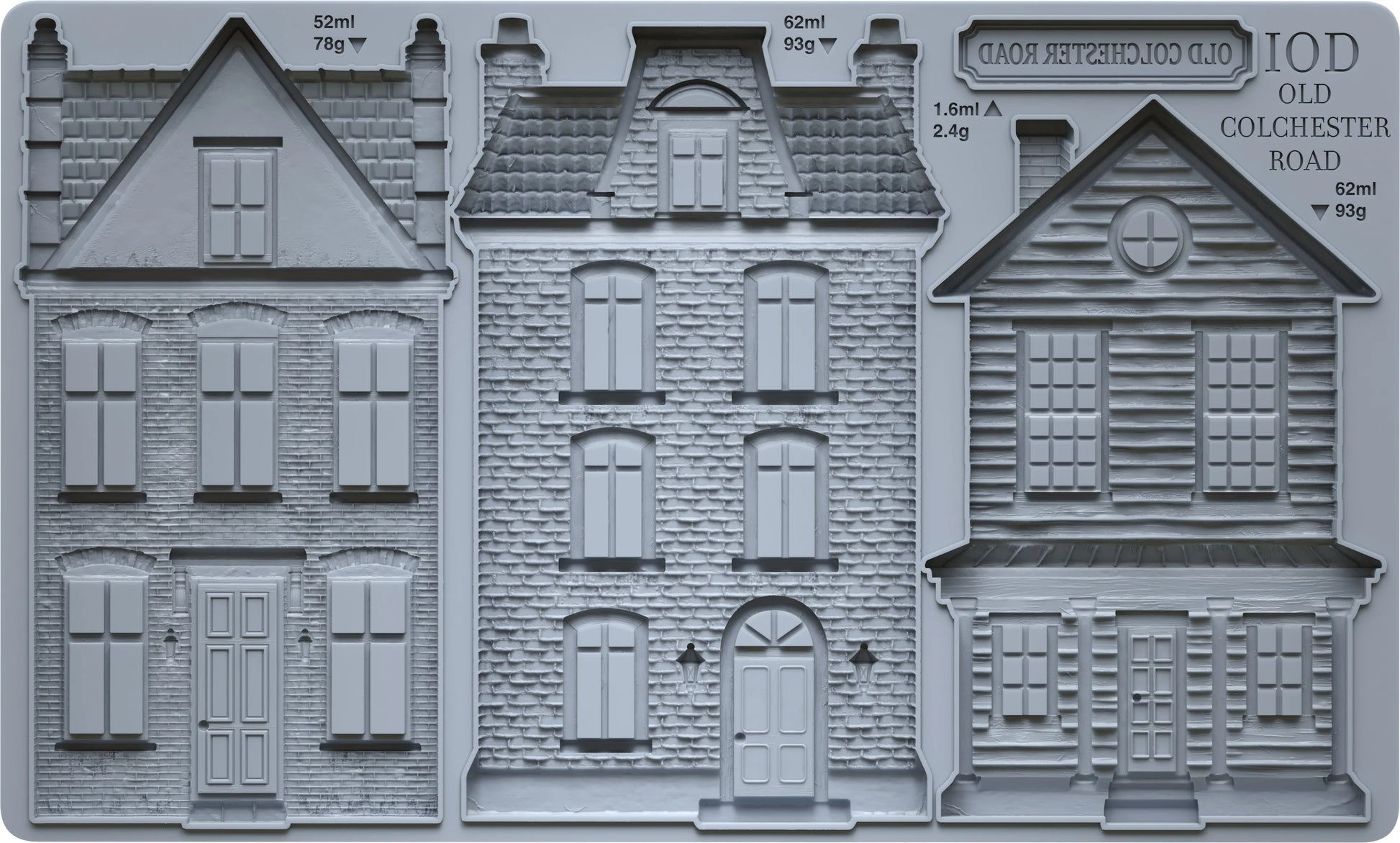 Three gray miniature house molds or relief designs shown side by side, with printed text reading 'IOD OLD COLCHESTER ROAD' and small measurements above each building.