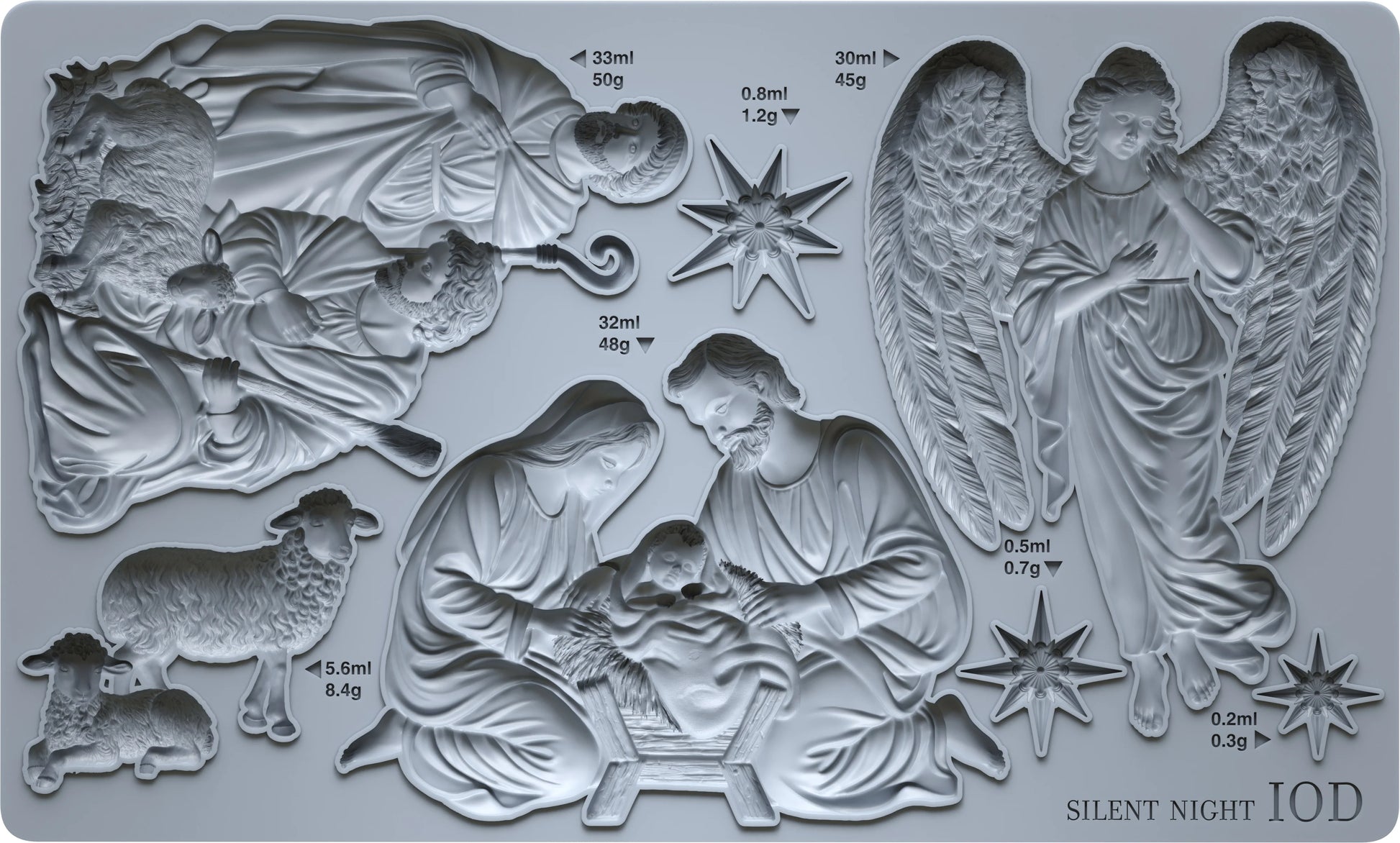 A silicone mold tray featuring multiple Christmas nativity and angel designs, including Mary, Joseph, baby Jesus, an angel, shepherds, and stars, with printed volume and weight measurements and the text 'SILENT NIGHT IOD' in the bottom right corner.