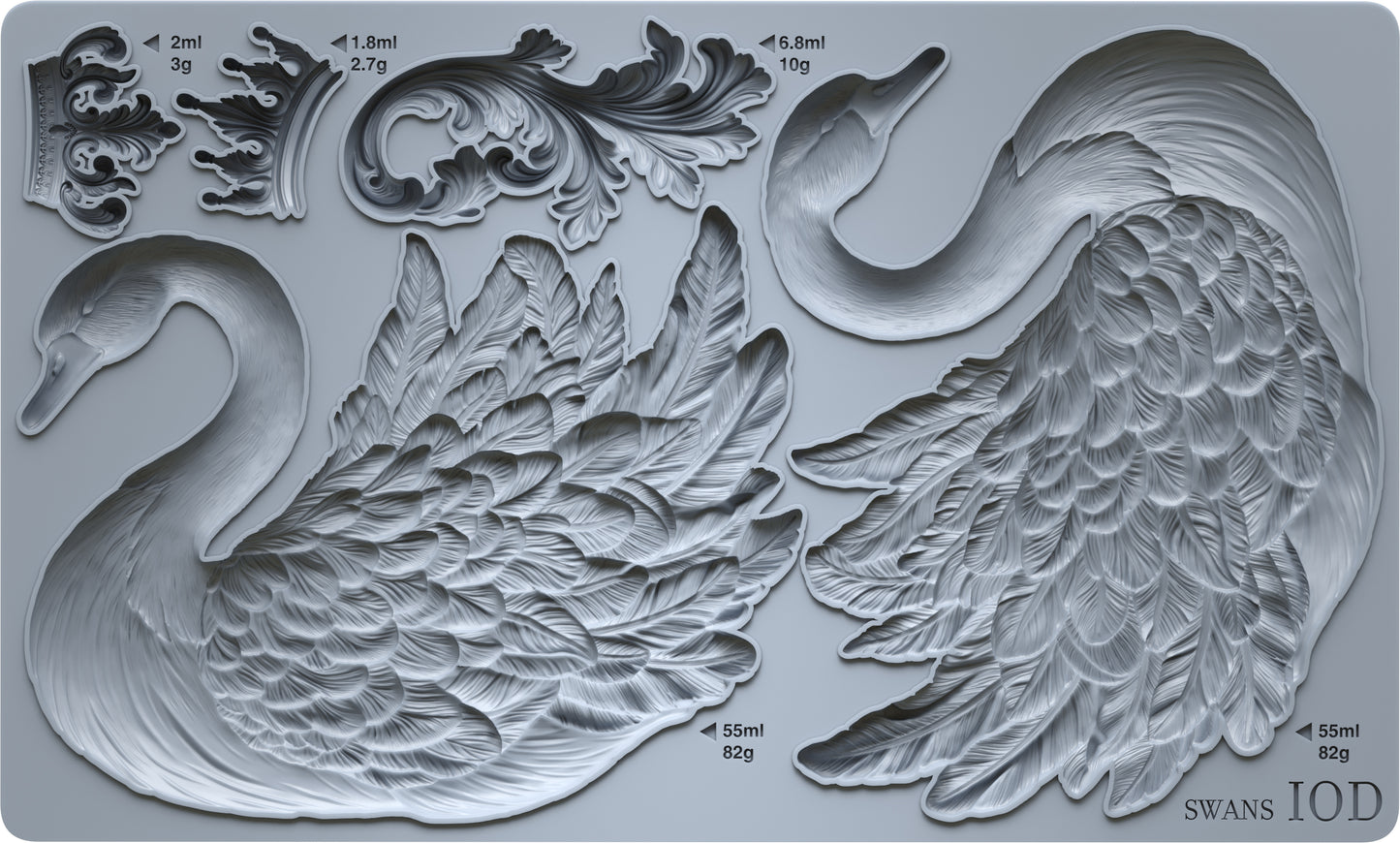 Metallic swan mold with intricate details on a gray background