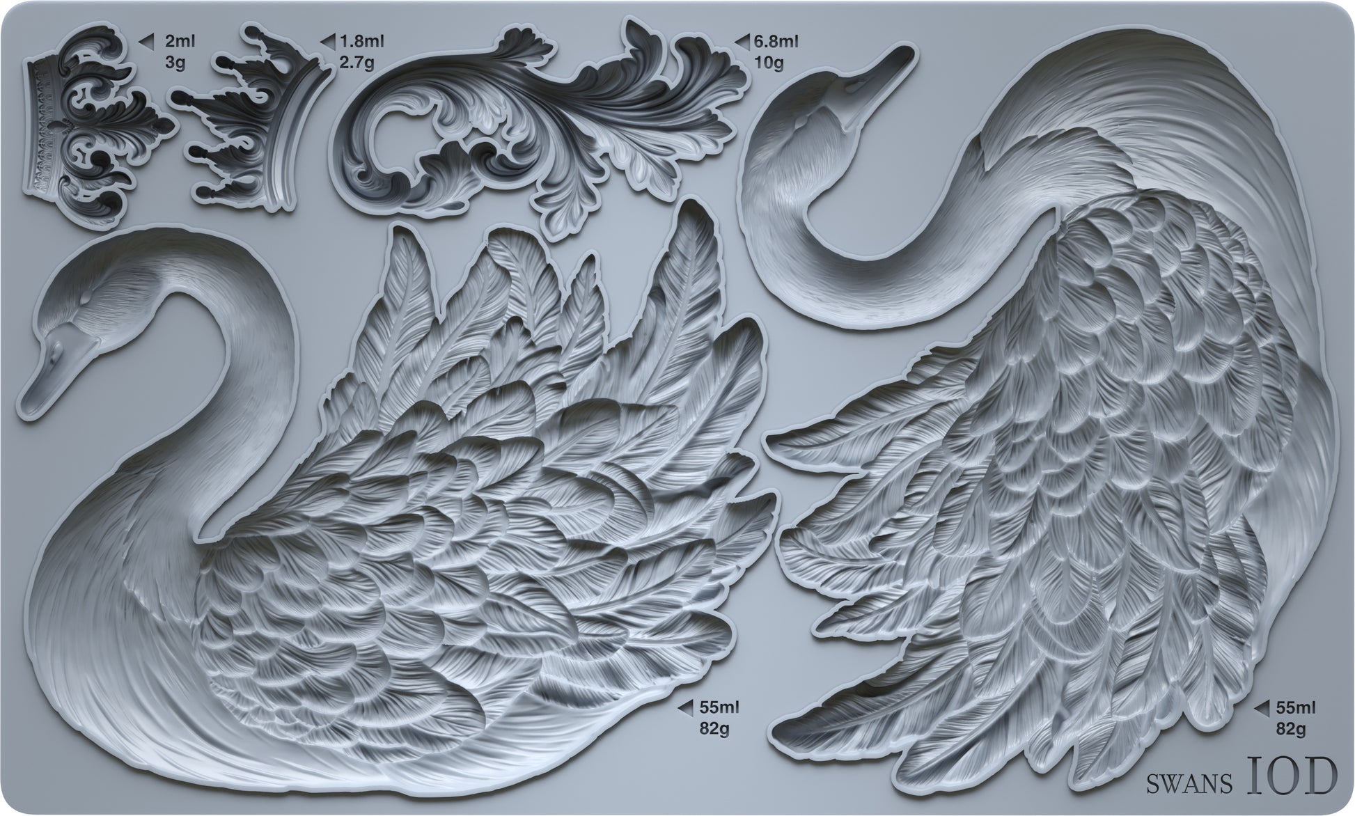 Metallic swan mold with intricate details on a gray background