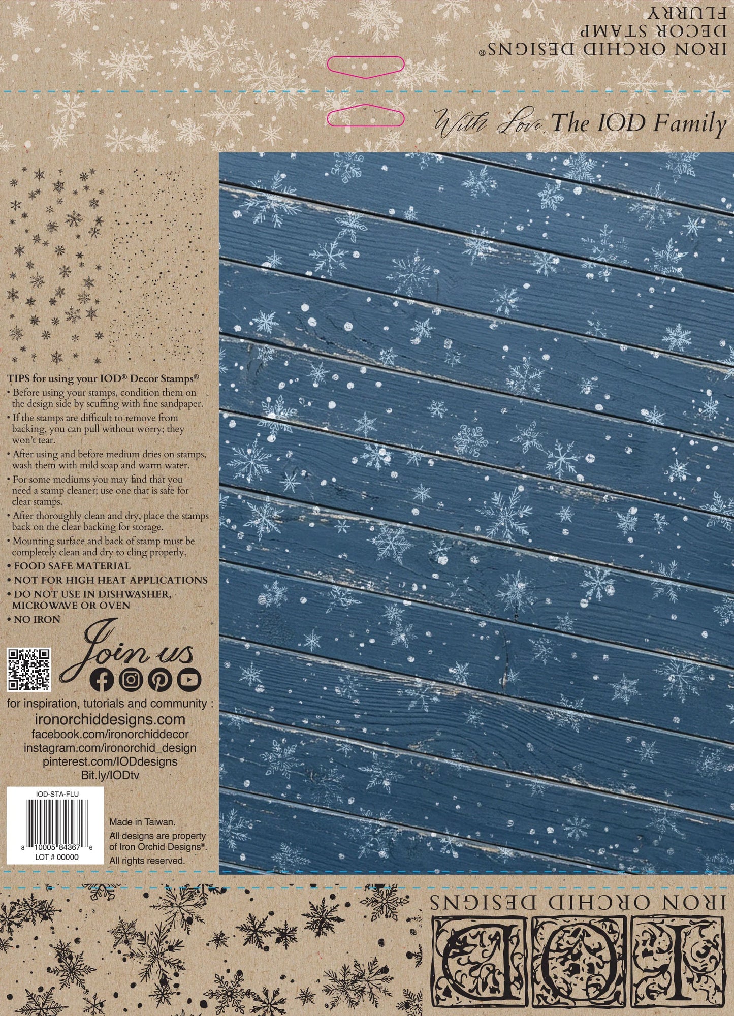 Back packaging of an Iron Orchid Designs 'With For The JOD Family' 12x12 stamp, featuring a blue wood-grain pattern with white snowflakes, alongside product details, a barcode, and contact information on a kraft paper background.
