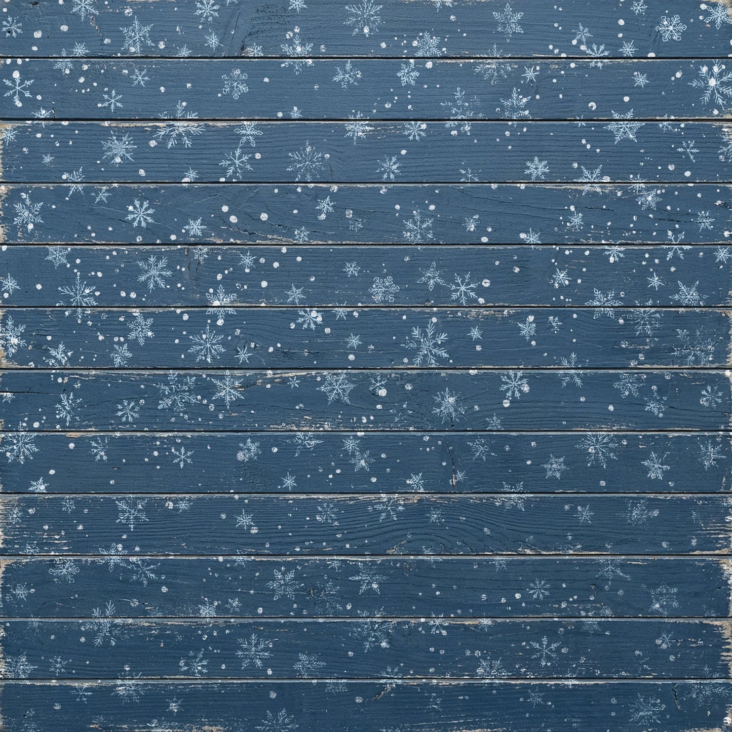 A square decorative panel or backdrop featuring a distressed blue wood plank design with scattered white snowflakes and snowflurries across the surface.