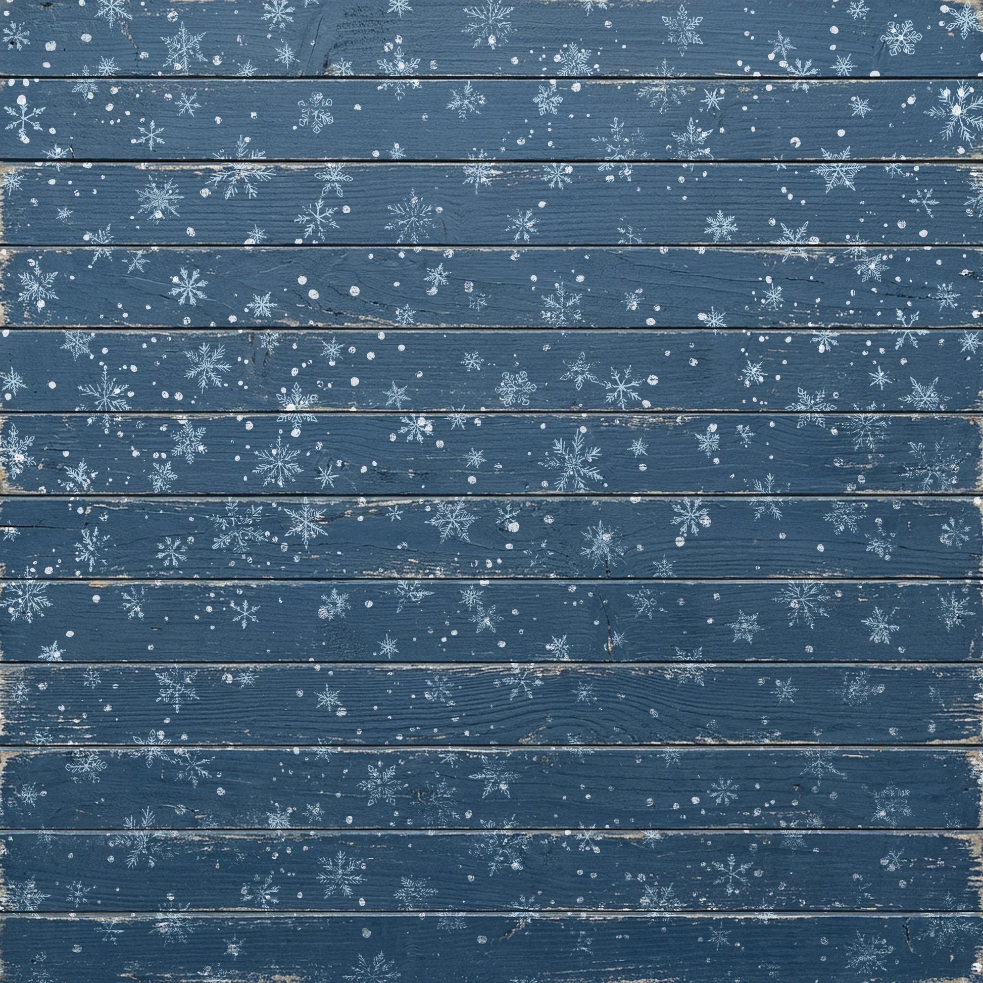 A square decorative panel or backdrop featuring a distressed blue wood plank design with scattered white snowflakes and snowflurries across the surface.