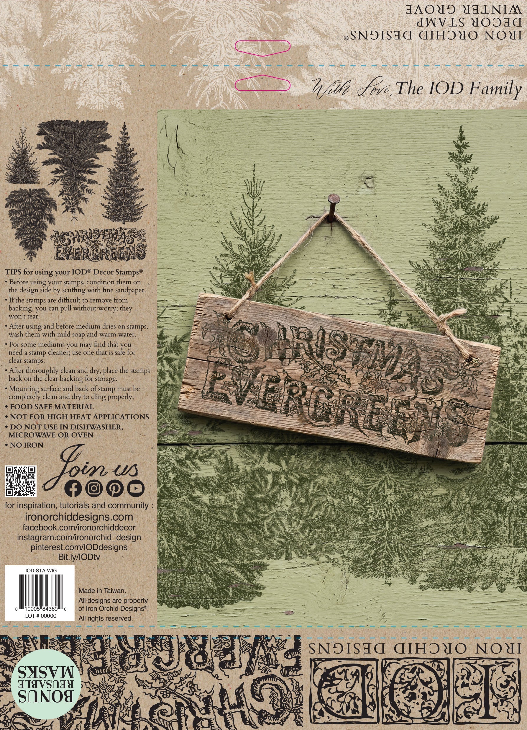 Back packaging of a 'Christmas Evergreen' iron-on design from Iron Orchid Designs, featuring a rustic wooden hanging sign with the words 'CHRISTMAS EVERGREEN' over a green pine forest background, alongside product details and application examples.