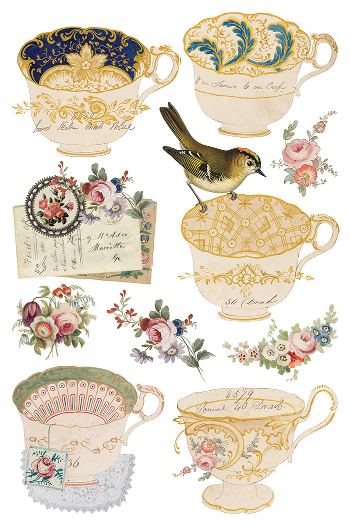 Vintage-style teacups with floral designs and a bird on a cup
