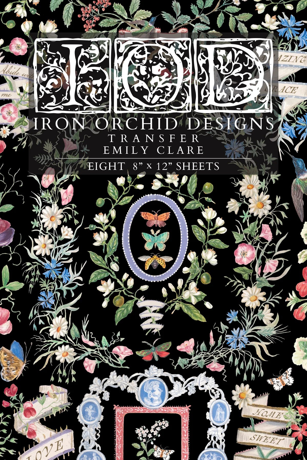 Iron Orchid Designs transfer paper with floral and decorative designs on a black background