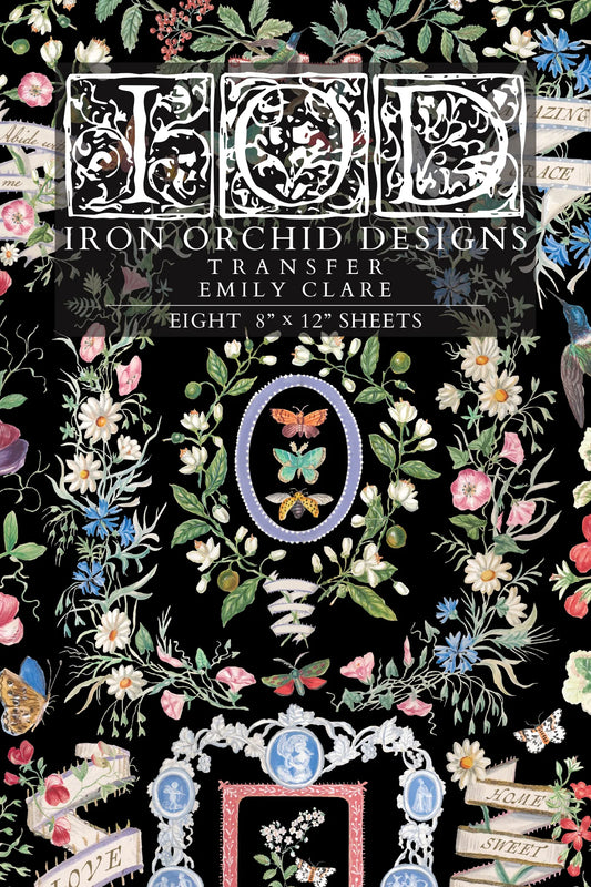 Iron Orchid Designs transfer paper with floral and decorative designs on a black background